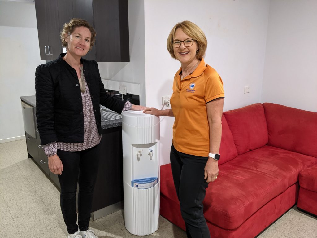 cooee water director Larnie helping a client to chose their water cooler for their office
